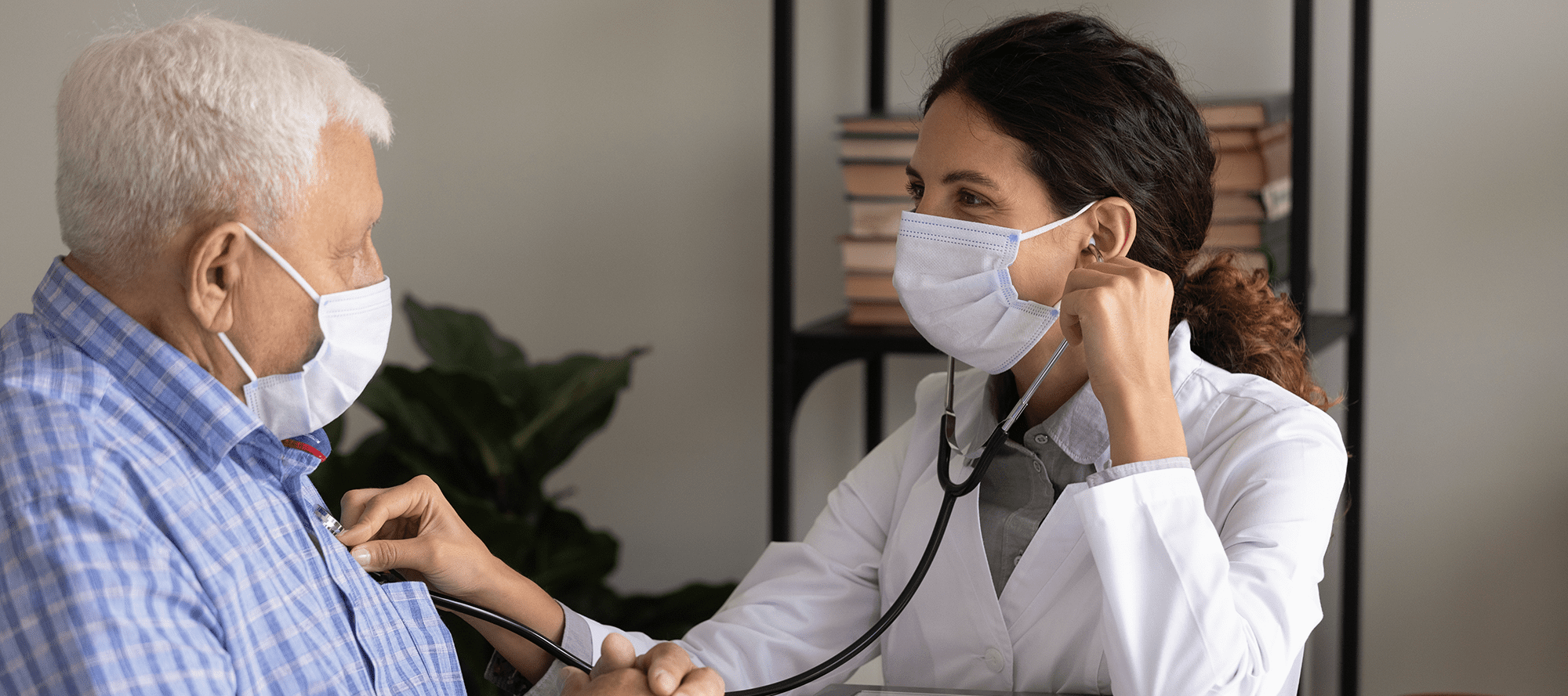 Doctor checking a patients lungs
