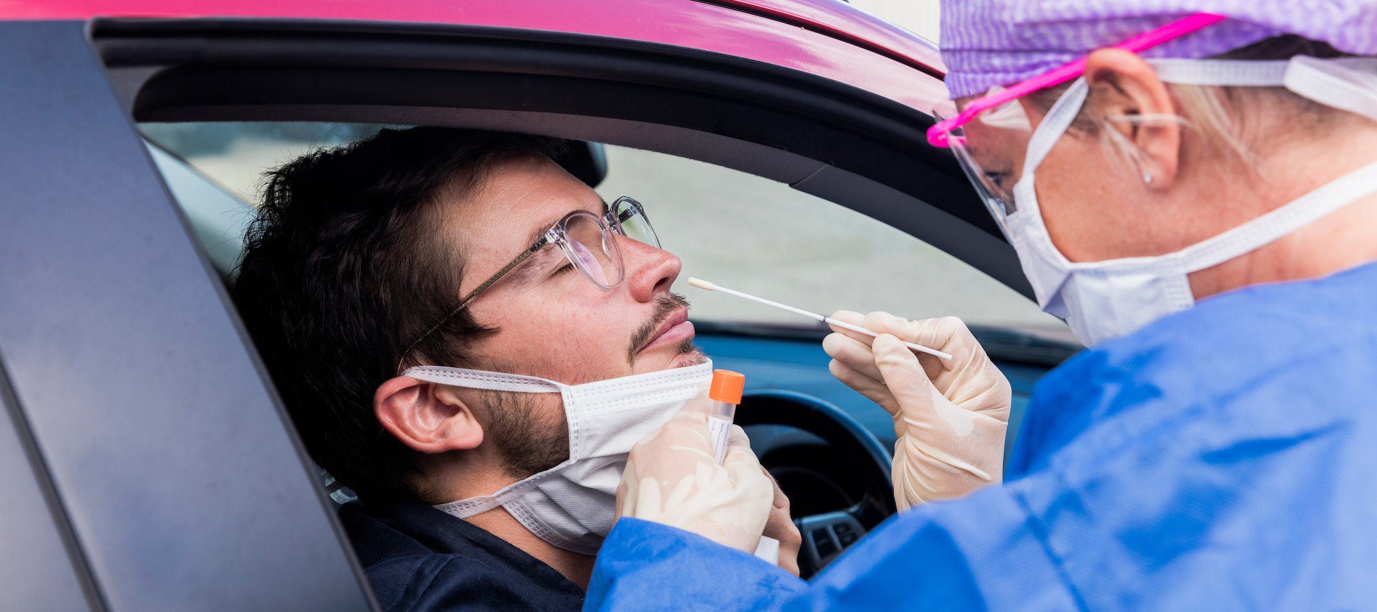 Doctor taking a nasal swab test