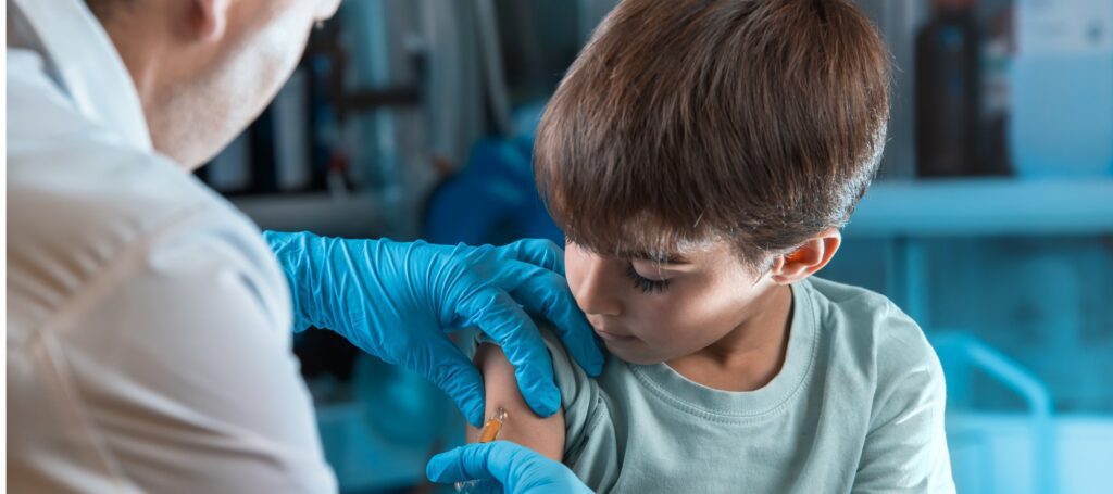 Young child getting a vaccine