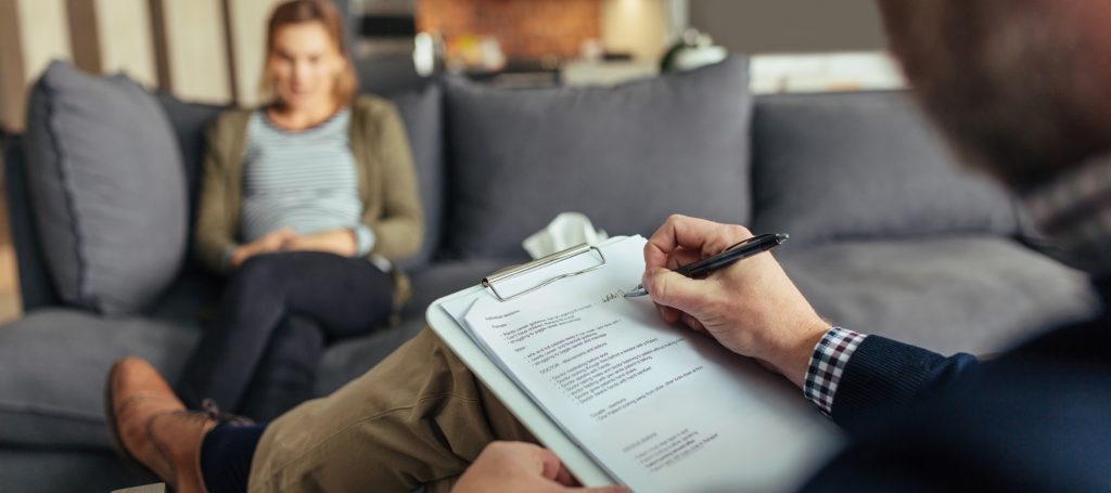 Neuropsychologist having session with client